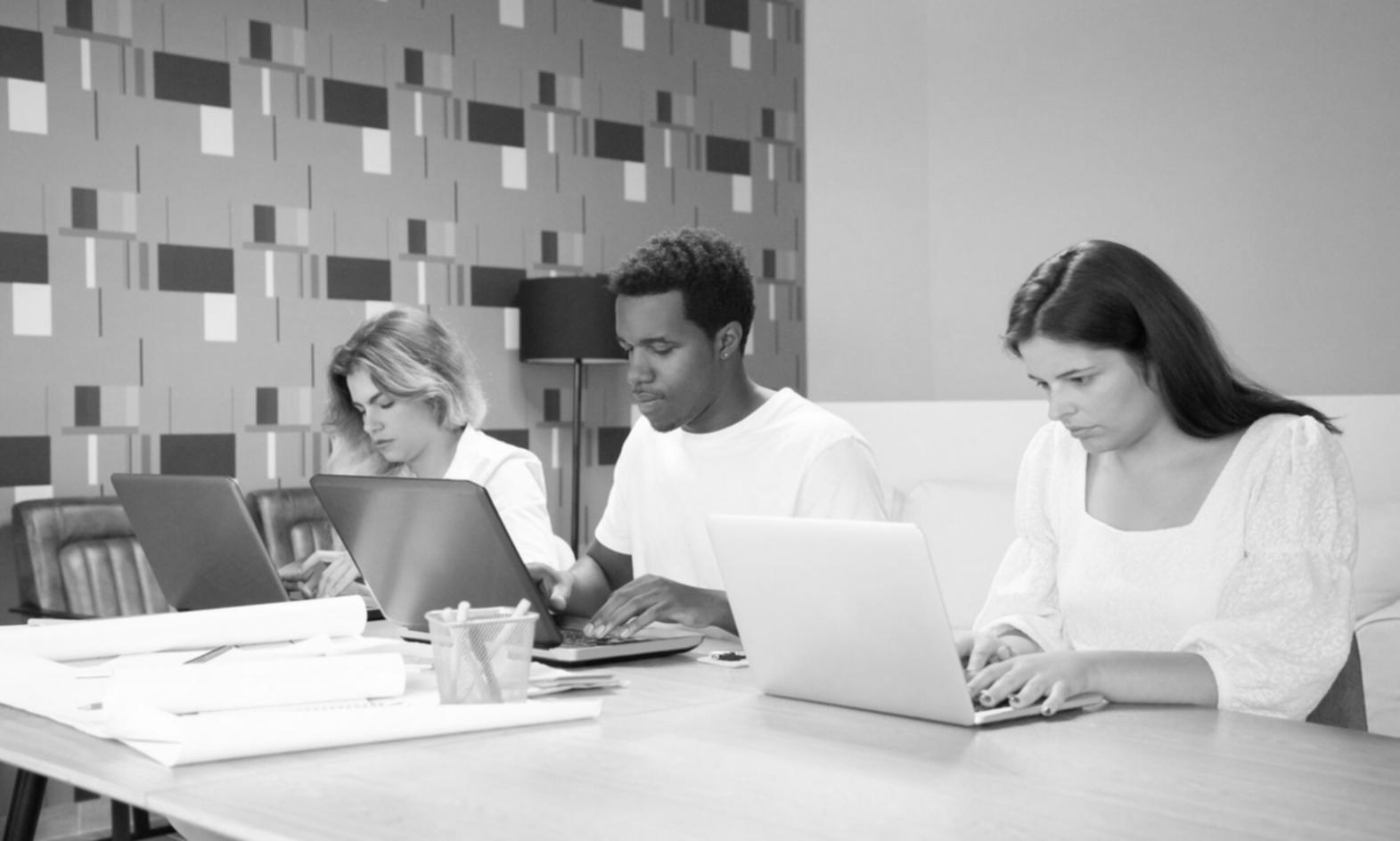 Family reviewing budget documents together at kitchen table